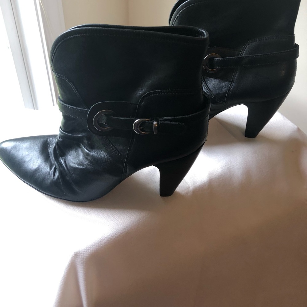 Black leather ankle boots with gathers on front